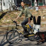 Biking Musician with Dog
